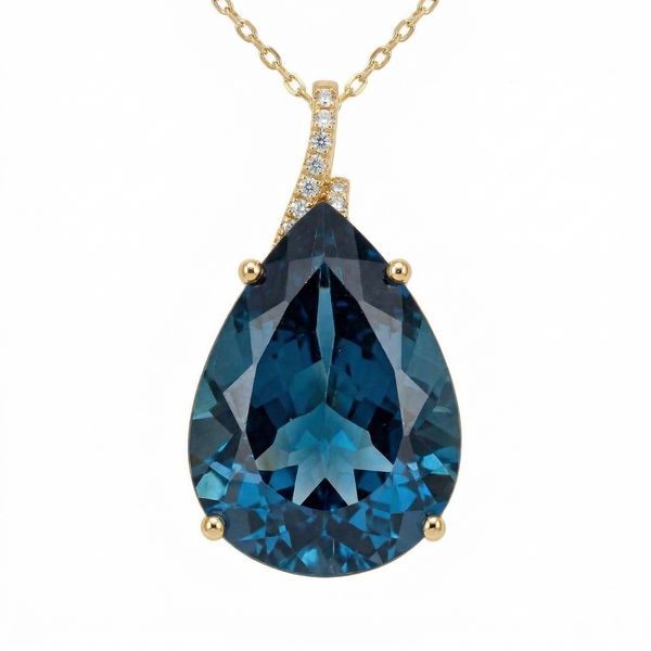 Closeup photo of 14k Yellow Gold London Blue Topaz with Diamond Necklace