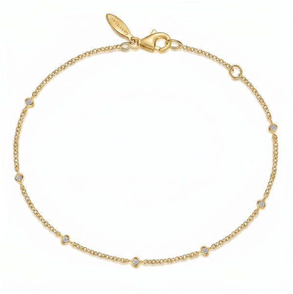 14KY .08CTTW RD DIA 7-STATION 7" BRACELET
