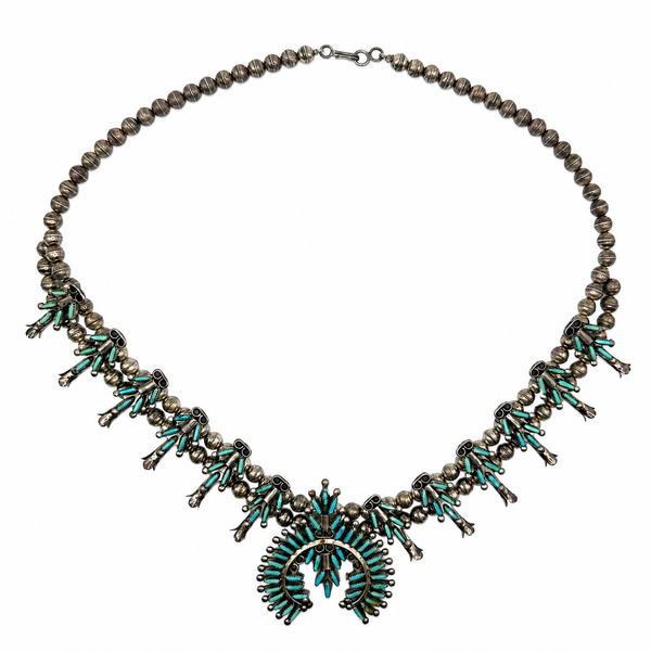 Closeup photo of 925 Sterling Native Zuni Turquoise Petite Point Squash Blossom 70.3g, 24"