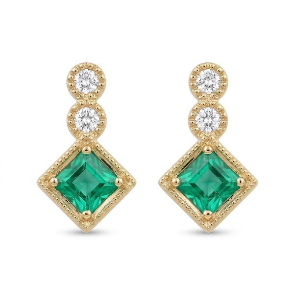 Closeup photo of 14k Yellow Gold .22ct Emerald and .08ct Diamond Studs