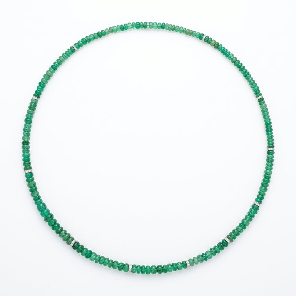 Closeup photo of 14K WG 500tcw Carved Emerald Bead and 1.20tcw Diamond 12 Rondel Necklace 107.2g