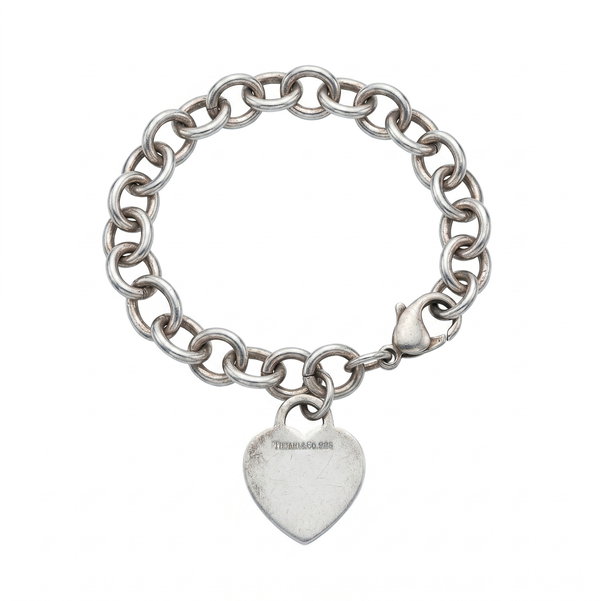 Closeup photo of 925 Sterling Tiffany & Co. Heart Tag Bracelet 34.3g 7.5"