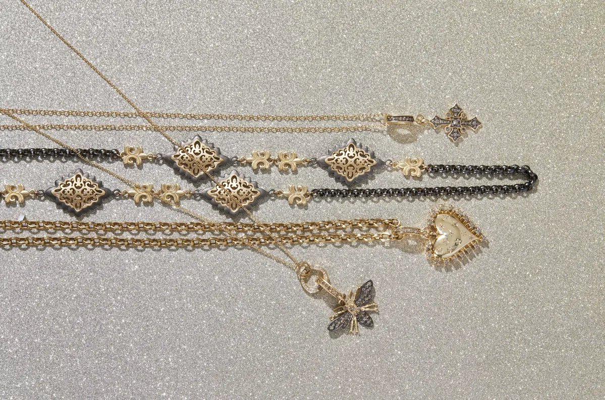 Vintage jewelry display with gold pieces