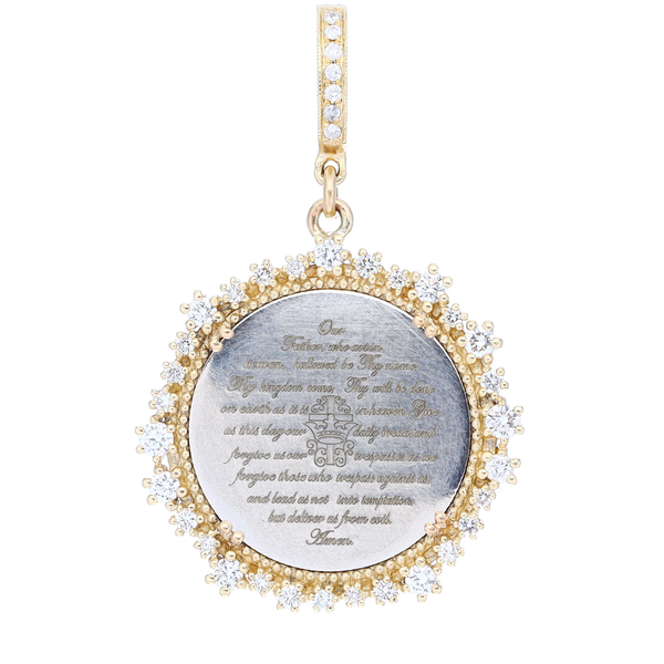 Closeup photo of Love Token Engraved With The Lords Prayer