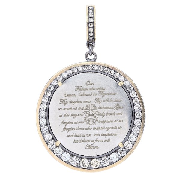 Closeup photo of Love Token with Engraved The Lords Prayer