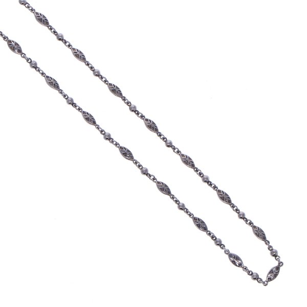 Closeup photo of Tiny Polished Marquise Rhodium Sterling Chain Link Necklace