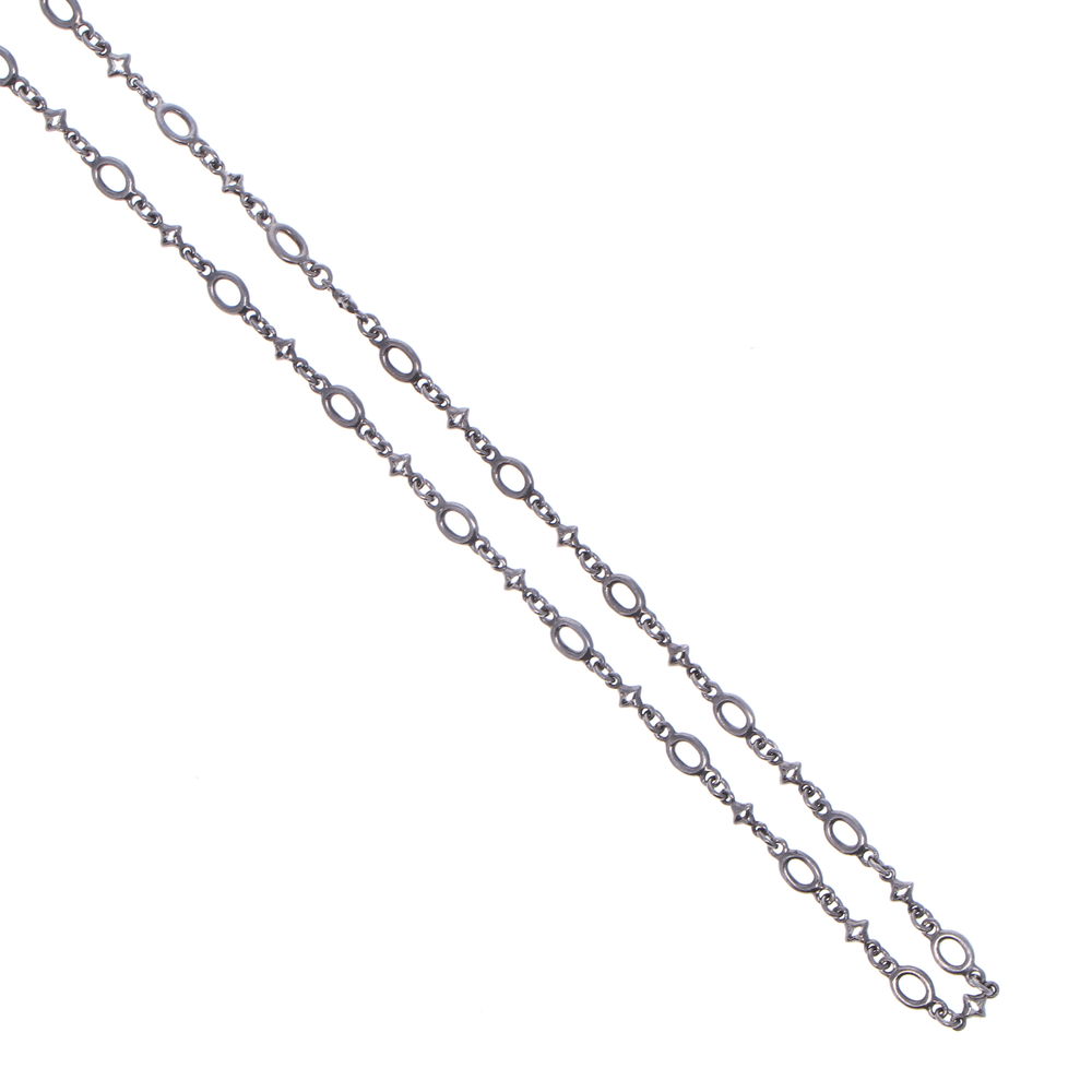 Shot of Polished Oval & Tiny Star Link Chain