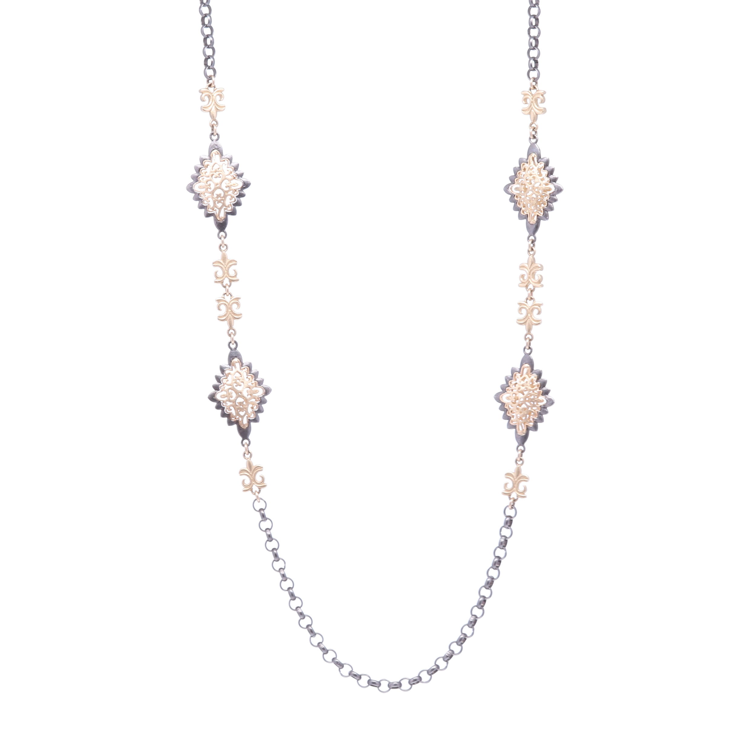 Handcrafted decorative layering chain with four abstract stations. This chain may be doubled or worn as a long layer. Made with 14k Gold 16.75g and Rhodium Sterling. Royal Abstract Gold Chain