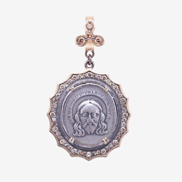 Closeup photo of Spanish 19th C. Christ and Lady of Montserrat Pendant