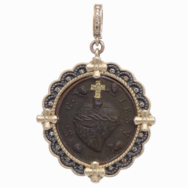 Closeup photo of Antique Sacred Heart with Cherubs Pendant