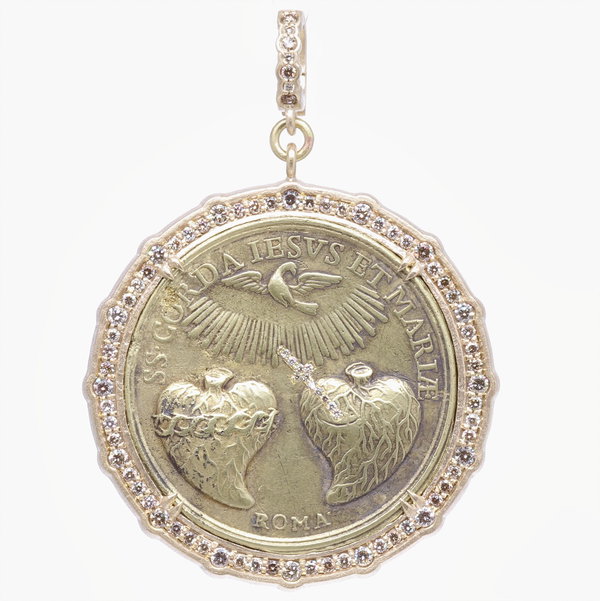 Closeup photo of The Sacred Heart of Jesus and Immaculate Heart of Mary Pendant