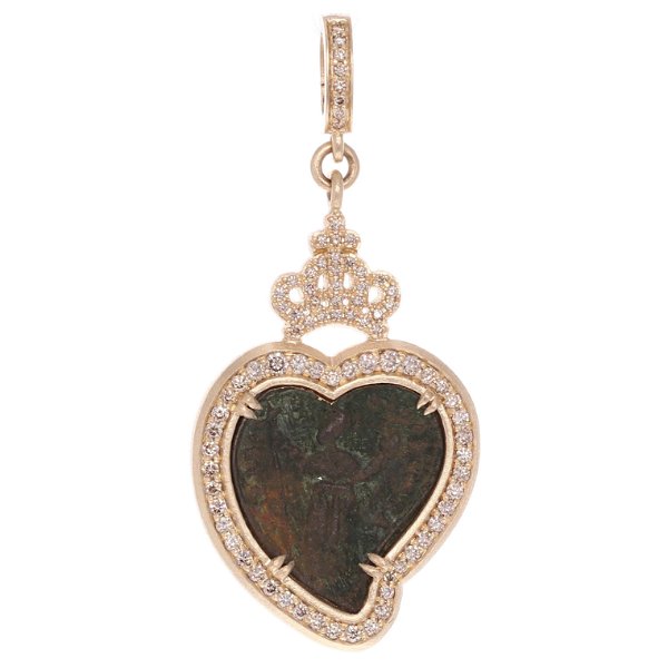 Closeup photo of Ancient Unknown Saint Heart Shaped Medal Pendant