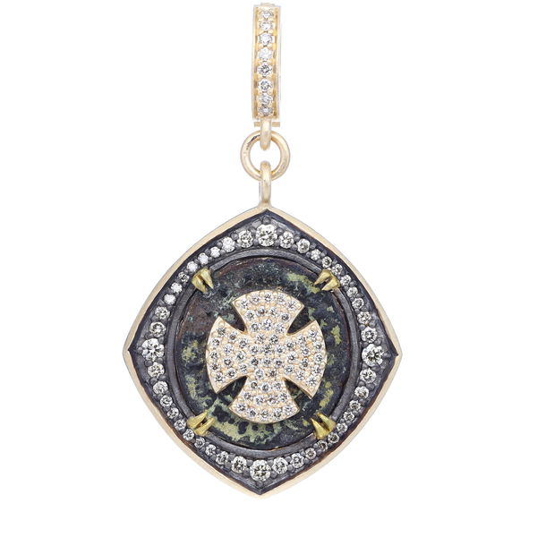Closeup photo of Antique St Benedict Medal w/ Cross Decal