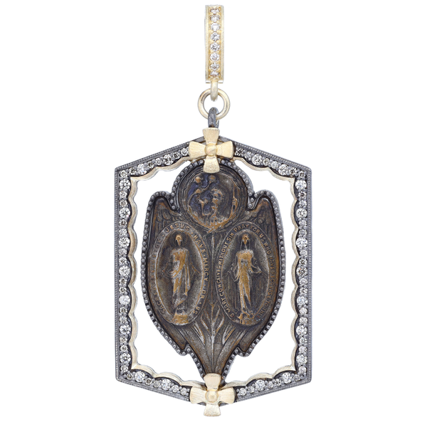 Closeup photo of Antique Sacred Heart Medal Pendant