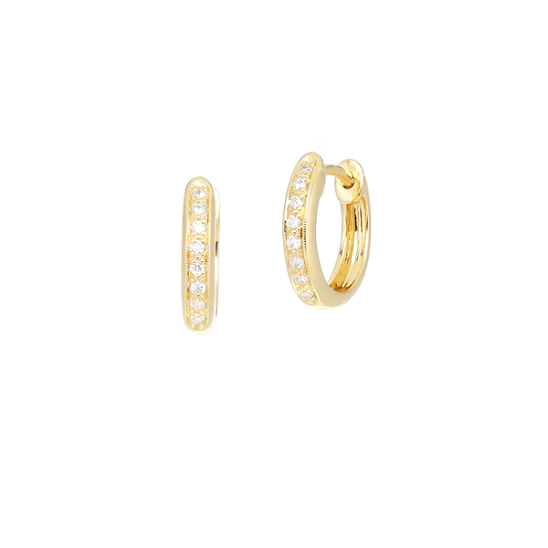 Closeup photo of White Diamond Huggies in Yellow Gold