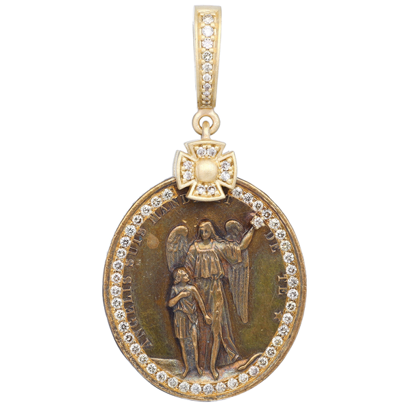 Closeup photo of French Antique Guardian Angel Medal Pendant