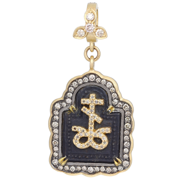 Closeup photo of Antique Sprouted Cross Medal Pendant