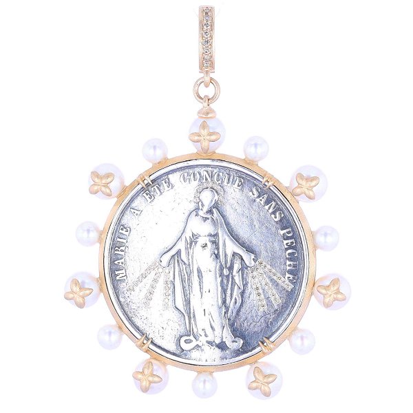 Closeup photo of Antique Virgin Mary Medal Pendant