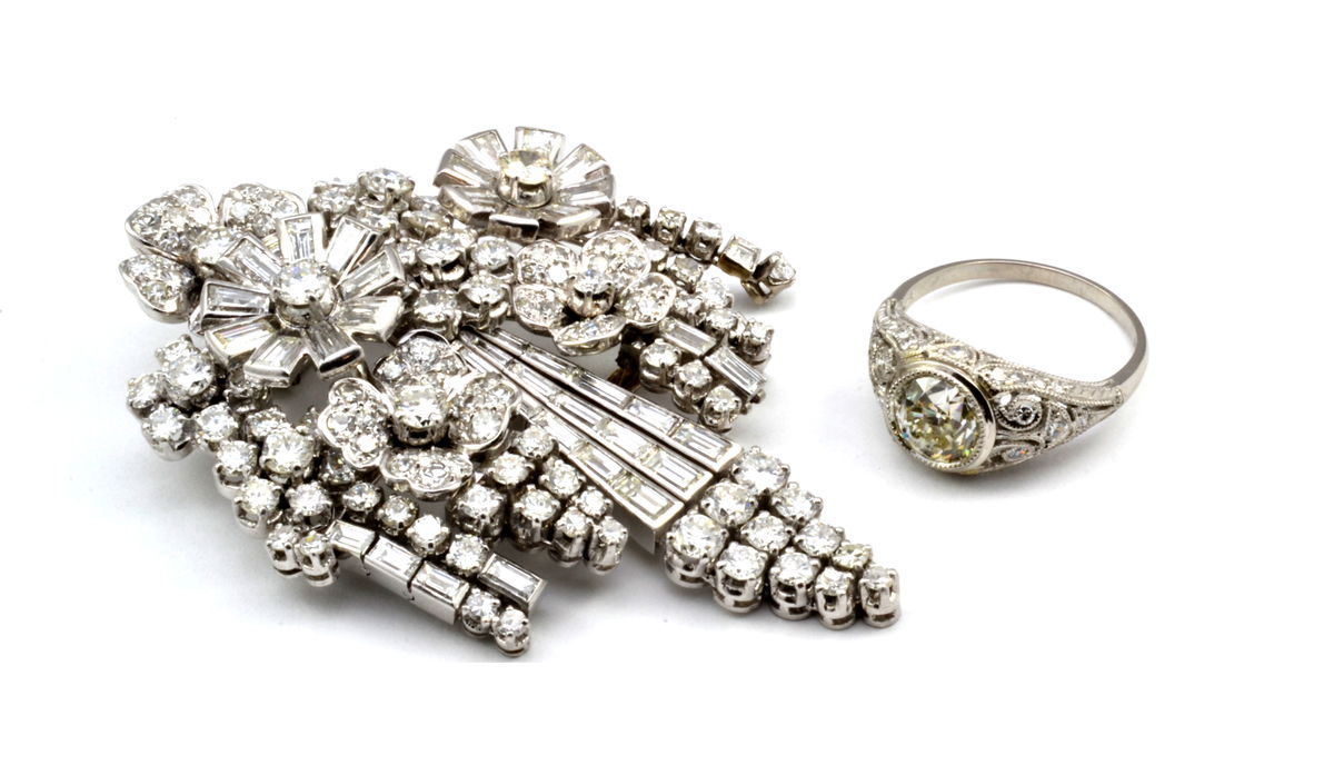A platinum diamond floral spray brooch