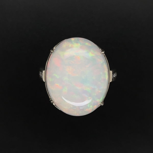 Closeup photo of 14K WG 22.50ct White Oval Opal & .32tcw Diamond Ring 10.5g, s11