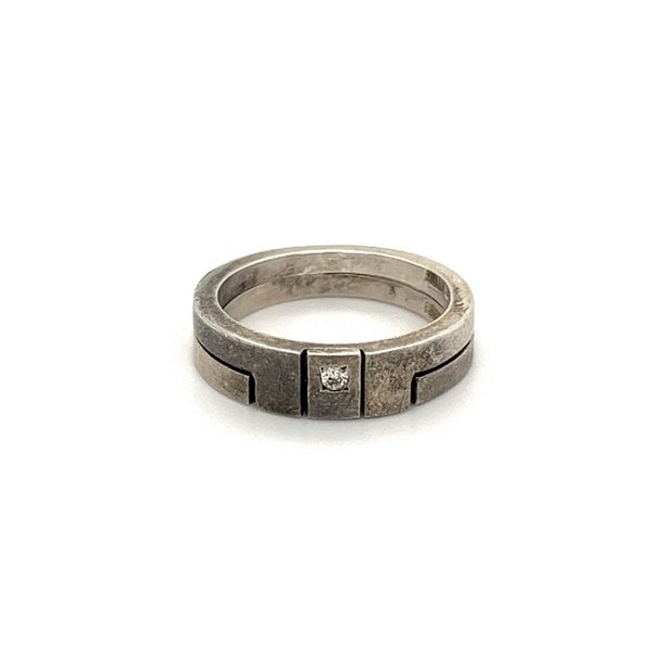 Closeup photo of 925 Sterling Interlocking Ring and Band .02ct Diamond 4.1g, s5.5