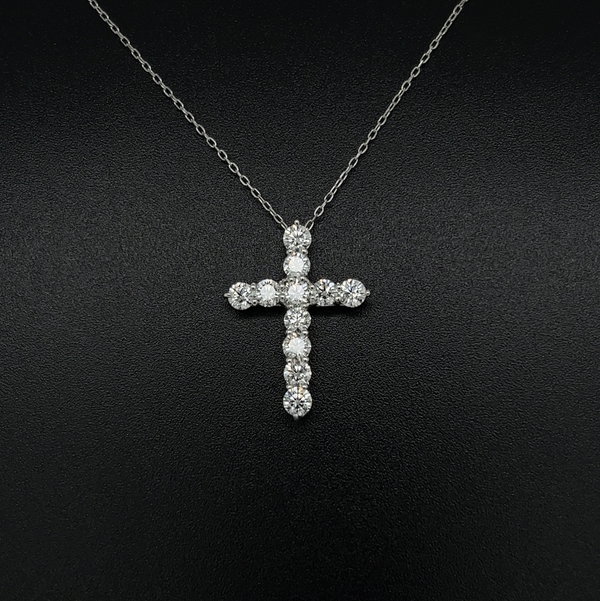 Closeup photo of Platinum 900 1.00 tcw 11 RBC Diamond Cross Necklace g on an 18K WG 18"Chain