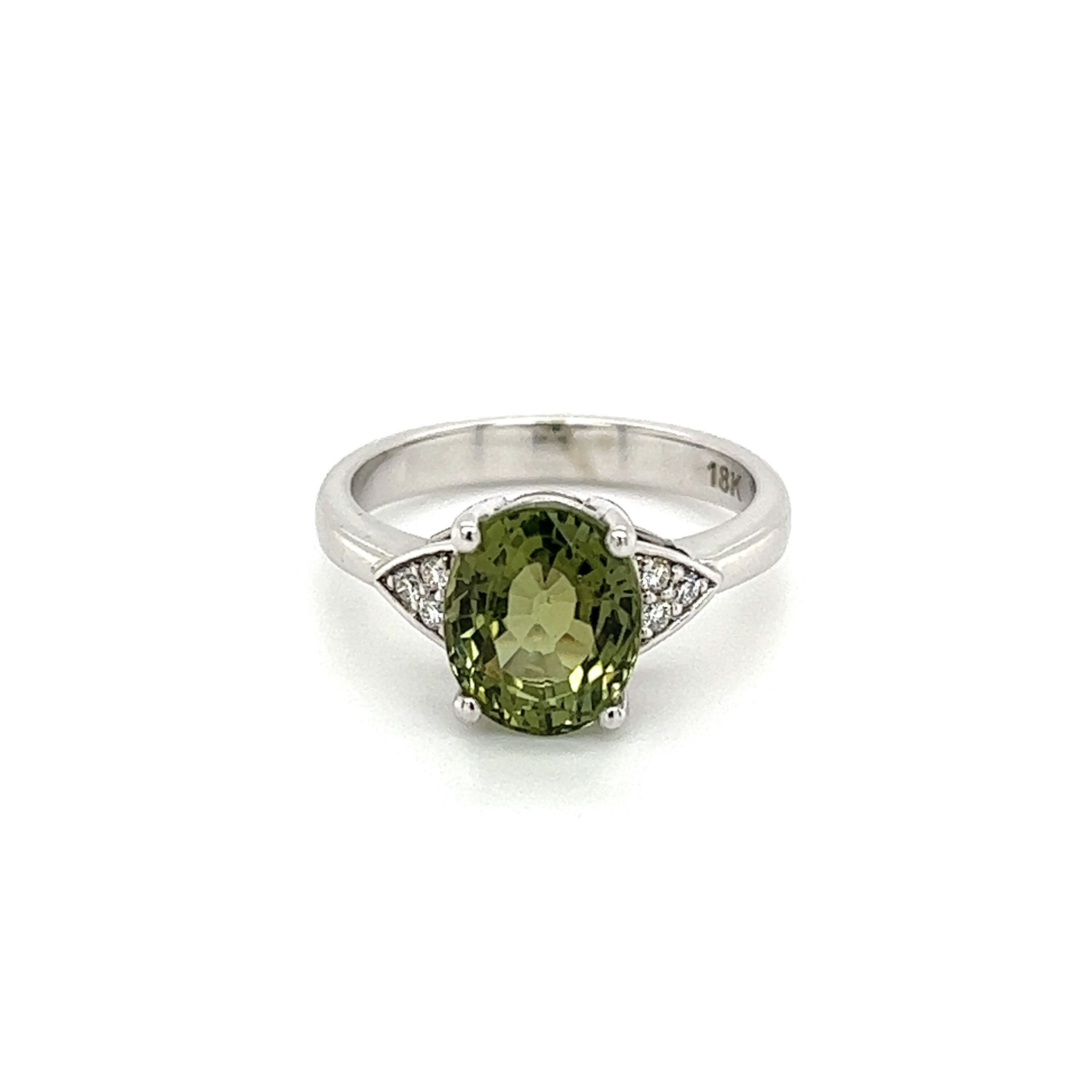 18K WG 2.50ct Oval Yellowish Green Tourmaline & .06tcw Diamond Ring 4.7g, s7 18K WG 2.50ct Oval Yellowish Green Tourmaline & .06tcw Diamond Ring 4.7g, s7
