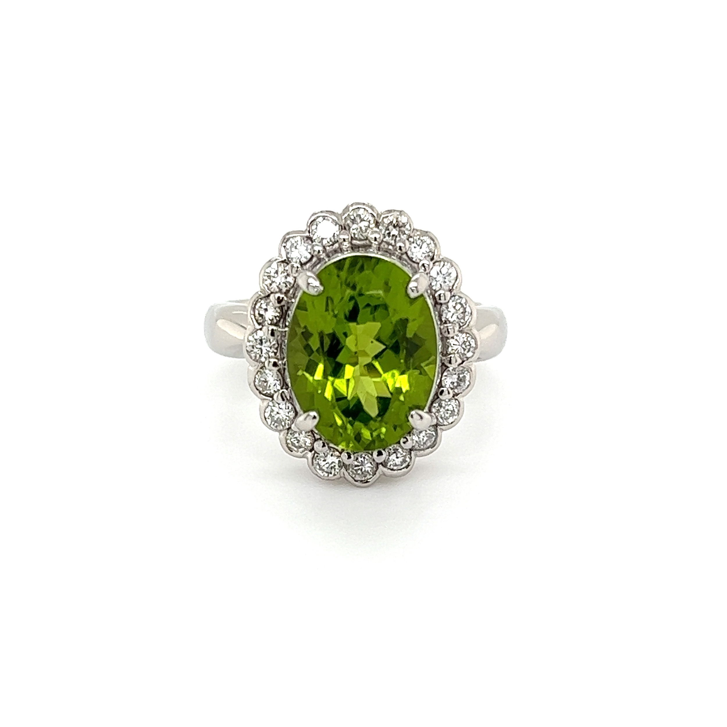 Platinum 4.19ct Oval Peridot & .50tcw Bezel Set Diamond Halo Ring 10.0g, s5,75 Platinum 4.19ct Oval Peridot & .50tcw Bezel Set Diamond Halo Ring 10.0g, s5,75
