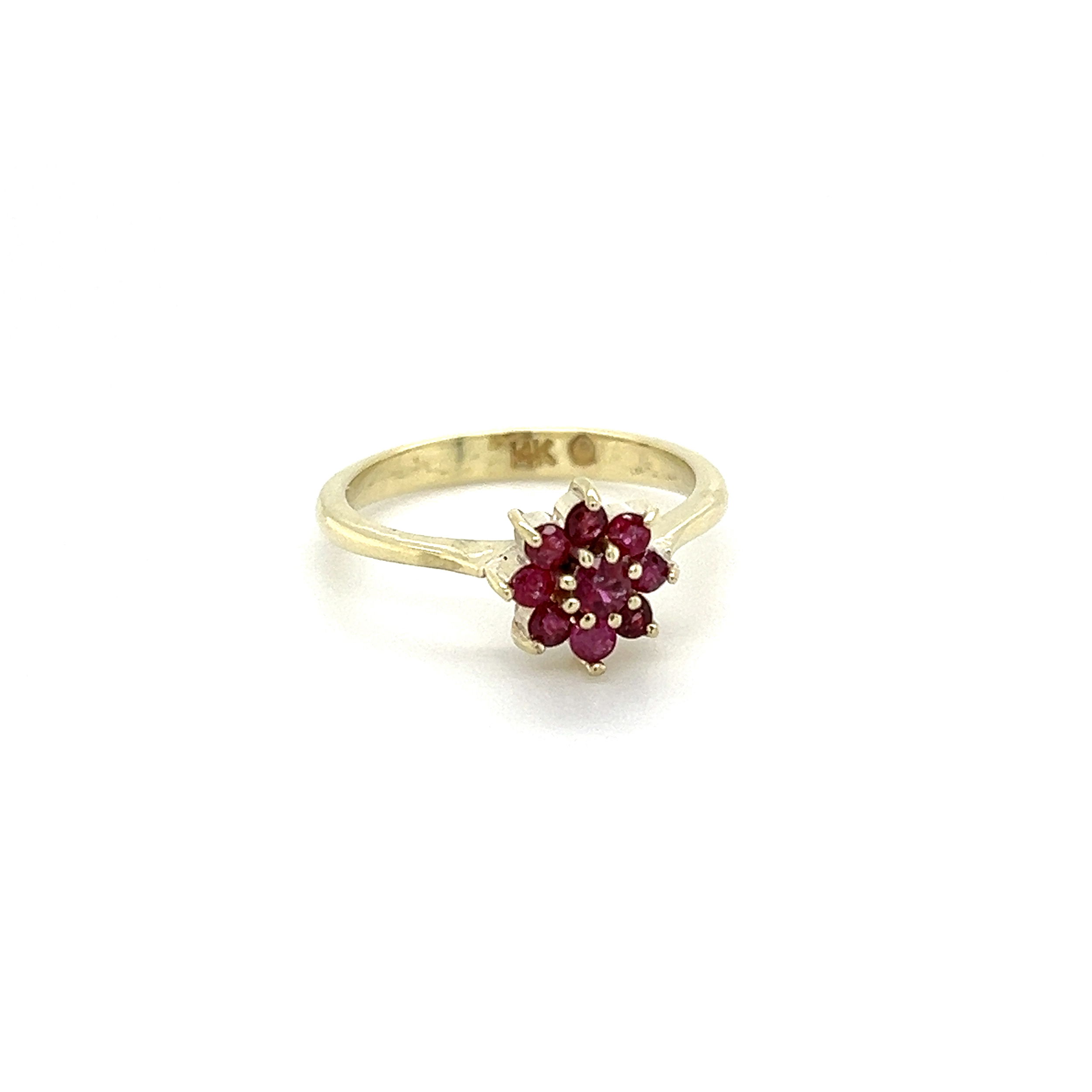 This lovely 14K Yellow Gold Vintage 9 Round Ruby Cluster Ring is a truly stunning piece. Featuring .25tcw of rubies set in the center in a round cluster design, this ring is sure to sparkle from every angle. With a comfortable 2.9g weight, this ring is offered in a size 6.75. A perfect piece of estate jewelry, this gorgeous ring is sure to be cherished for generations. 14K YG Vintage 9 Round Ruby .25tcw Cluster Ring 2.9g, s6.75