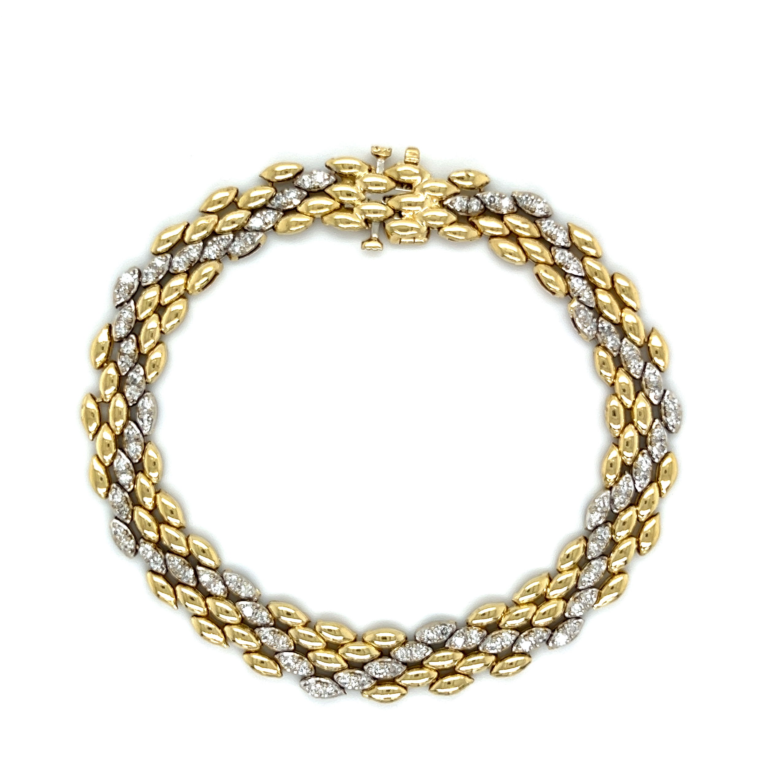 This 14K Yellow Gold 3 x 2 Alternating 1.50tcw Diamond 8.75mm Link Bracelet is an exquisite piece of Estate jewelry. This luxurious bracelet features 8.75mm diamond-studded links alternating between 2 x 1 links with a total diamond weight of 1.50tcw. This unique design, crafted from 16.9 grams of 14K yellow gold, measures 7.75 inches in total length for the perfect fit. Treat yourself or a loved one to this regal bracelet and make a statement. 14K YG 3 x 2 Alternating 1.50tcw Diamond 8.75mm Link Bracelet 16.9g, 7.75"