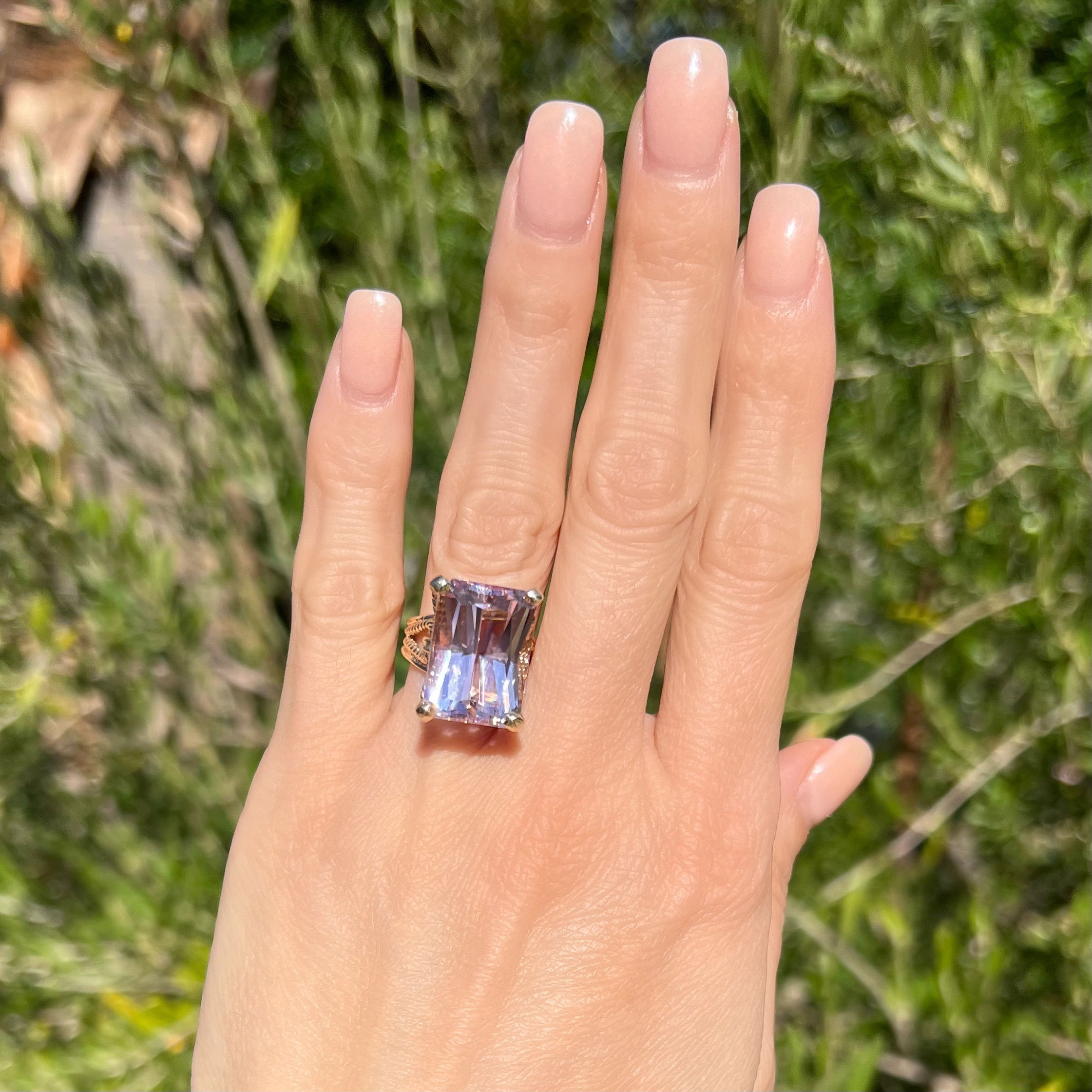This beautiful 14K Yellow Gold Kunzite Rectangular Fancy Cut Solitaire Ring is a unique and elegant piece. This stunning ring features an impressive 19.84 carat Kunzite stone in a wrapped rope solitaire design with a weight of 11.1 grams and a size of 6.5. The ring has a luxuriously yet discreetly crafted setting that make this solitaire ring an eye-catching accessory for any occasion. A perfect everyday piece of jewelry, this versatile ring will bring a sparkle to your wardrobe or an extra special gift for your loved one. 14K YG 19.84ct Rectangular Fancy Cut Kunzite in Wrapped Rope Solitaire Ring 11.1g, 6.5