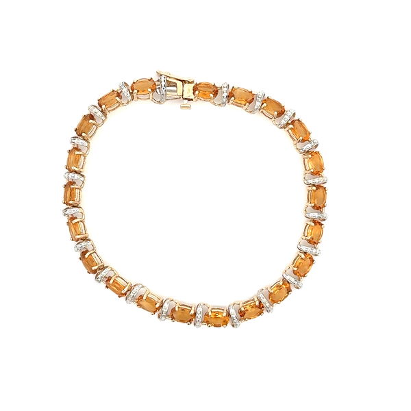 Closeup photo of 10K YG 6.50tcw Oval Orange Citrine Line Bracelet 8.1g, 7"