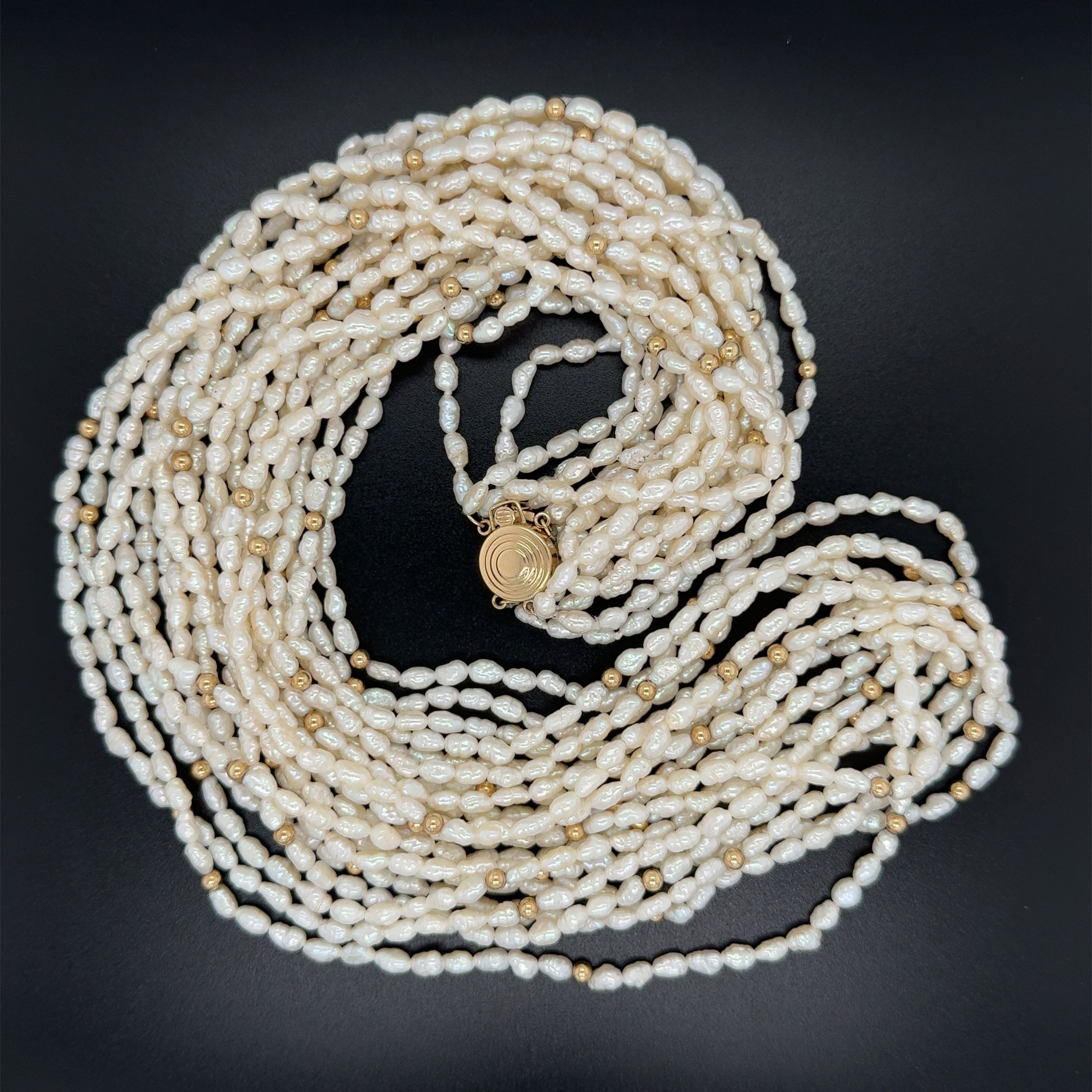 14K YG 9 Strand Freshwater Pearl and Gold Bead Necklace 83.3g, 24"