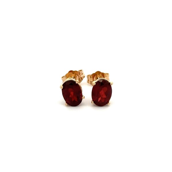 Closeup photo of 14K YG 1.60tcw Oval Red Garnet 7x5mm in 4 Prong Solitaire Earrings 1.2g