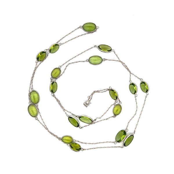 Closeup photo of Platinum 30.00tcw 19 Station Oval Peridot Set In Hand Link Chain Necklace 17.1g, 40"