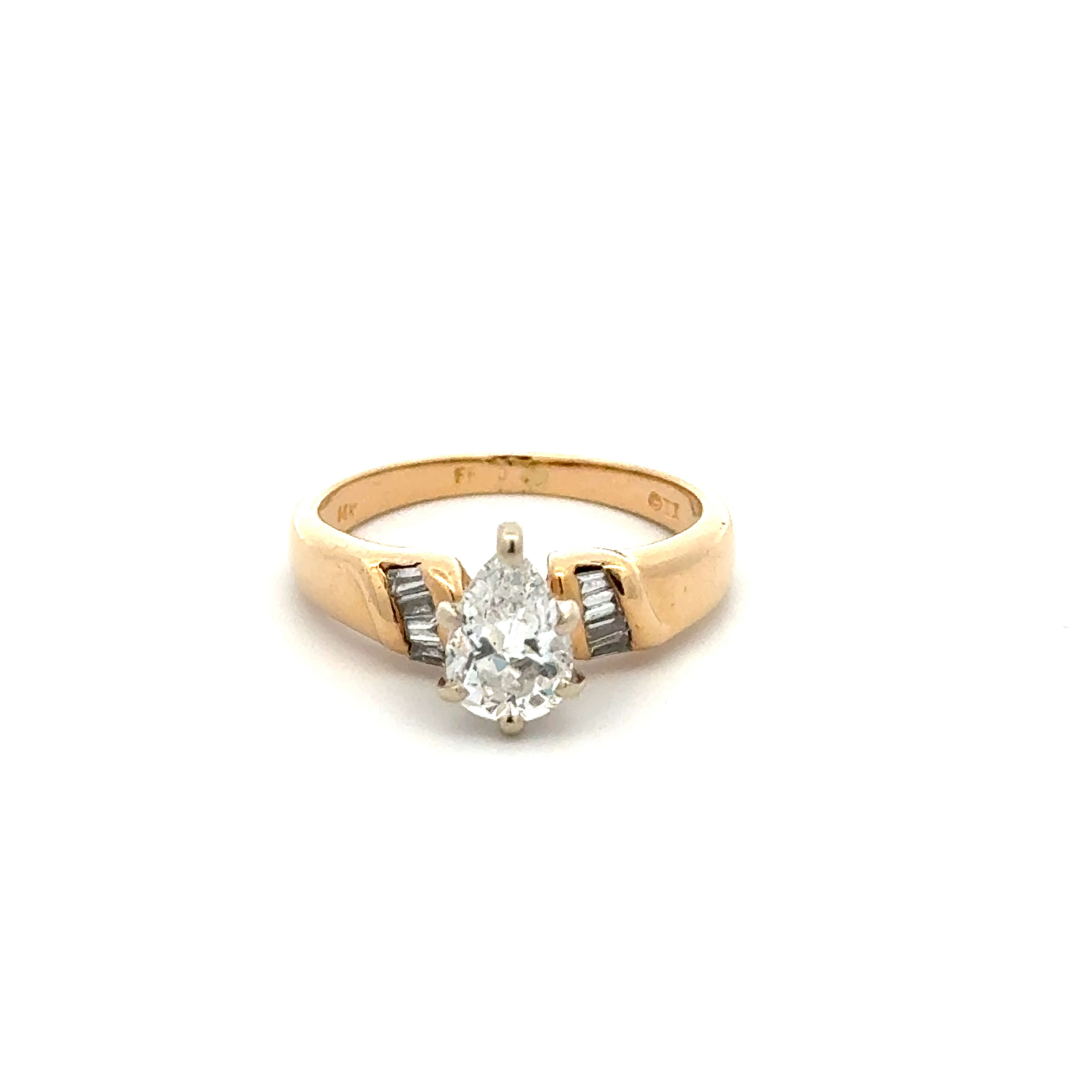 14K YG .74ct Pear Diamond & .16tcw Baguette Diamond Ring 3.3g, s5.25 14K YG .74ct Pear Diamond & .16tcw Baguette Diamond Ring 3.3g, s5.25