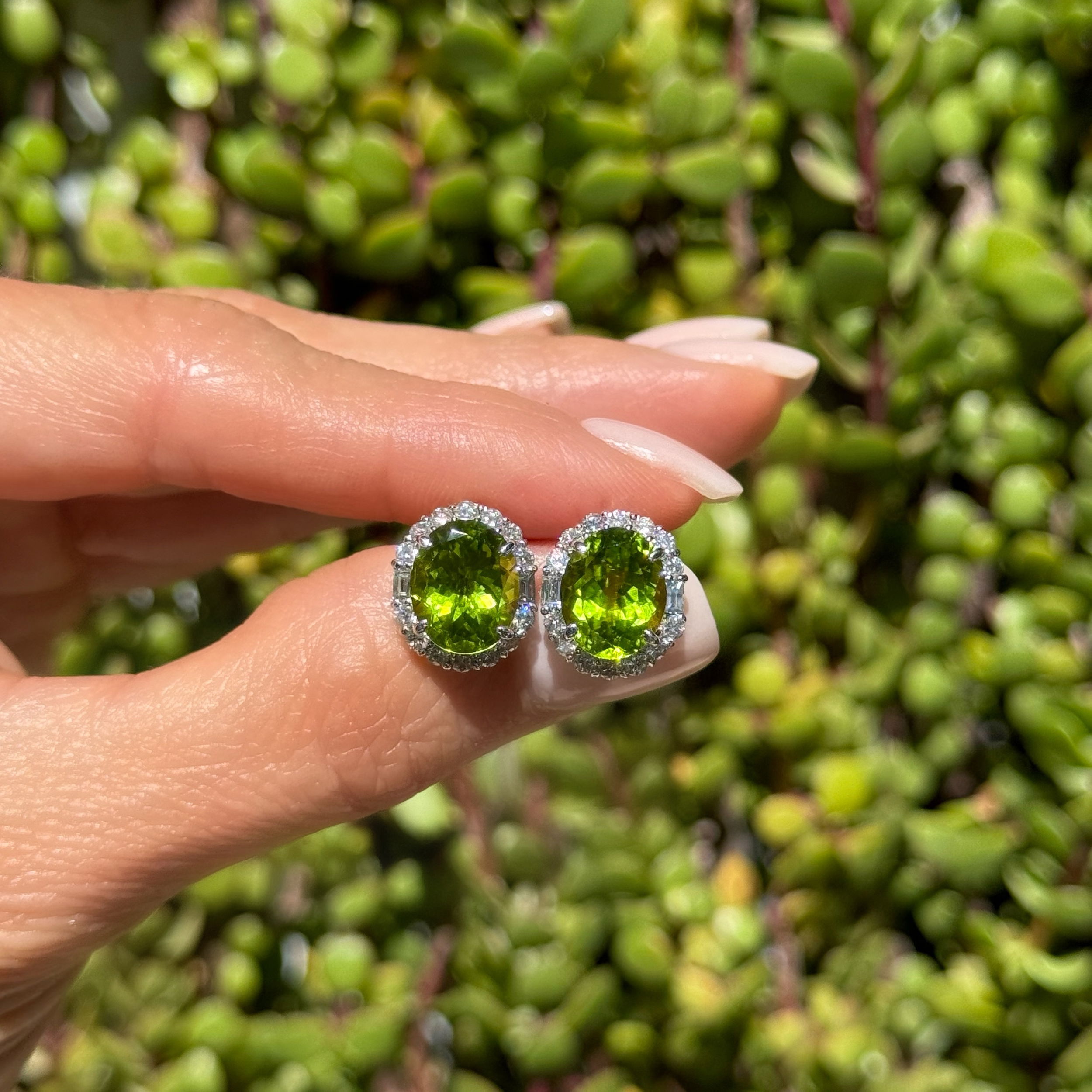 18K WG 7.84tcw Oval Peridot & 1.04tcw Baguette & RBC Diamond Halo Stud Earrings 5.2g