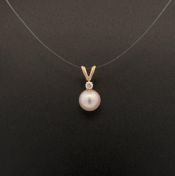 Closeup photo of 14K YG 7.50mm White Pearl & .05tcw RBC Diamond Pendant 0.9g