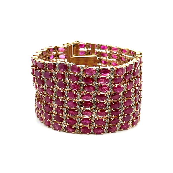 Closeup photo of 14K YG 8 Row 120tcw Oval Ruby GIA & 9.00tcw Diamond 1.6" Wide Bracelet 161.9g, 7.5"