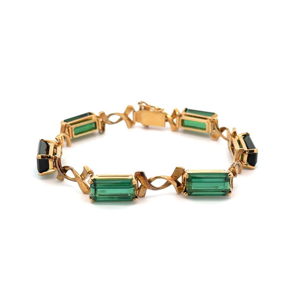 Closeup photo of 18K YG 18.00tcw Gorgeous Emerald Cut Green Tourmaline X Link Bracelet 24.3g, 7.5"