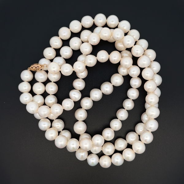 Closeup photo of 14K YG 8.5mm White Cultured Pearl Strand Necklace 98.4g, 35"