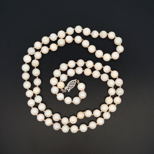 Closeup photo of 14K WG 6.4mm White Cultured Pearl Strand Necklace 29.6g, 23"