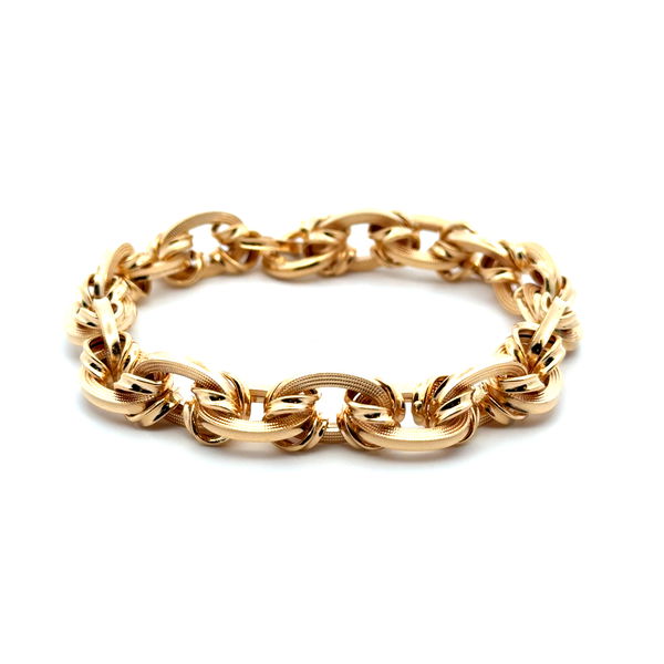 Closeup photo of 18K YG Polished and Textured Oval Link Bracelet 17.8g, 8"