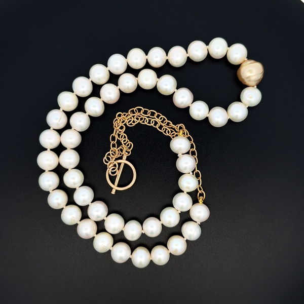 Closeup photo of 14K 7y 11.25 - 9mm Freshwater Pearl Strand Necklace 47.2g, 24"