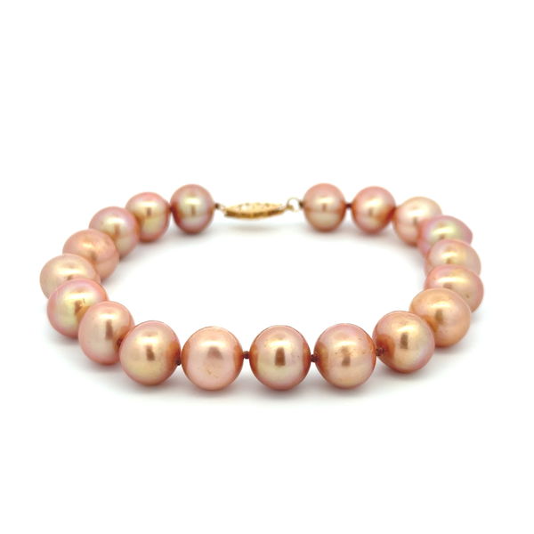Closeup photo of 14K YG 9.50mm Pinkish Golden Pearl Strand Bracelet 21.6g, 7.5"