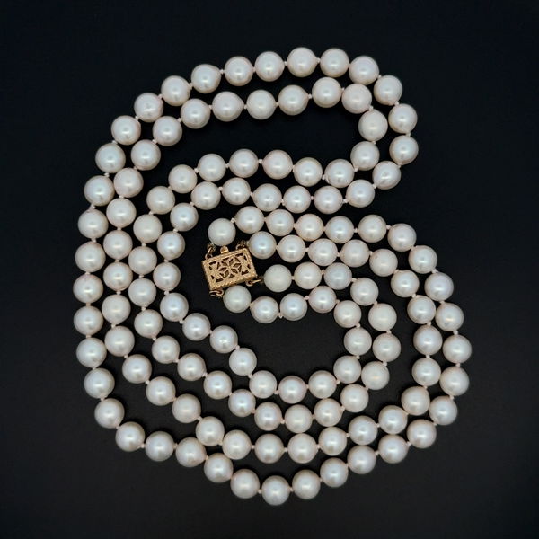 Closeup photo of 14K YG 7.2mm White Pearl Double Strand Necklace 72.8g, 20"