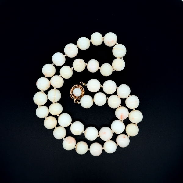 Closeup photo of 14K YG 1960s 10mm Angel Skin Coral Strand Necklace 61.8g, 18"
