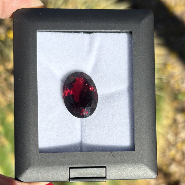 Closeup photo of 22.17ct Oval Pyrope Red Garnet 20.04x15.01x9.33mm