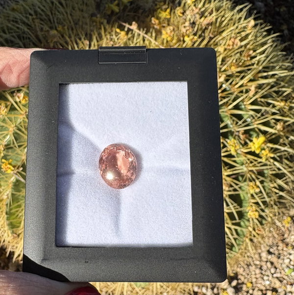 Closeup photo of 7.74ct Oval Peach Tourmaline 14.5x12mm