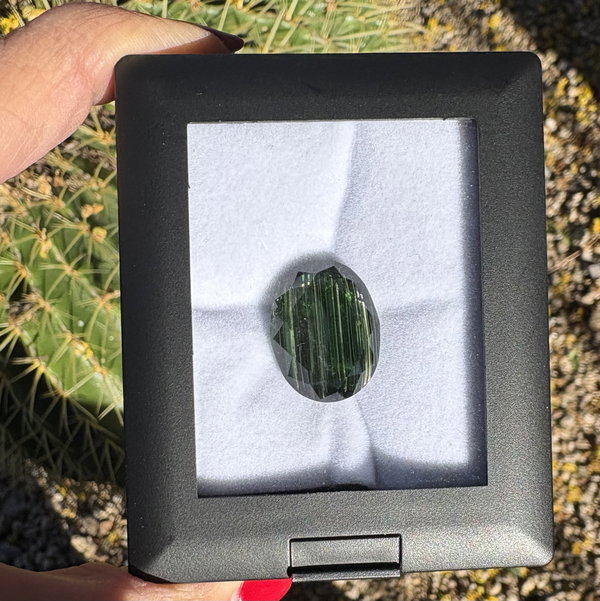 Closeup photo of 20.71ct Oval Green Tourmaline Rutile Needle Inclusions 20.40x15.72x10.07mm